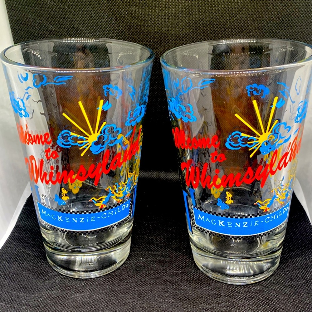 Pair of Mackenzie-Childs Welcome to Whimsyland Glasses.